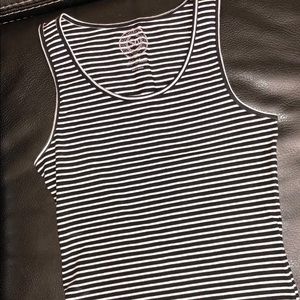 Super cute, stretch crop top. Never worn.